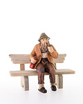 Man sitting on bench (10701-12) 